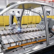 Automation automobile factory concept with 3d rendering robot assembly line with electric car battery cells module on platform